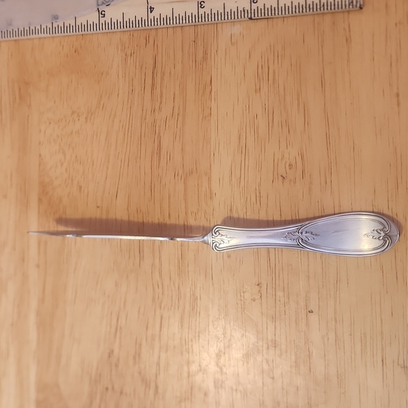 Vintage WM Rogers butter knife with twisted handle. - Picture 3 of 8